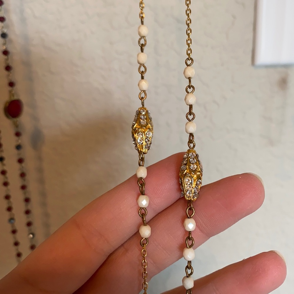 Long gold and cream necklace